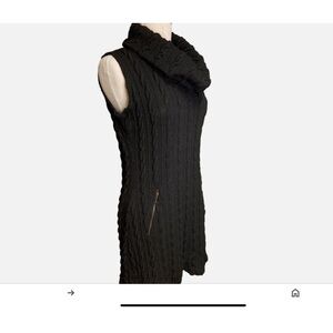 SOLD…Sleeveless turtleneck sweater dress.Black Sz M. Zipper pockets.